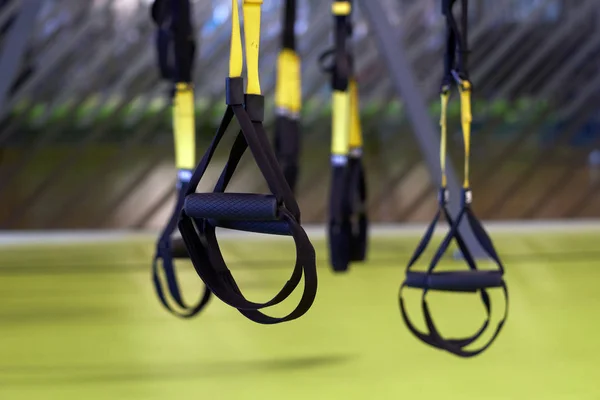 Image of a trx suspension in closeup inside of a gym. — Stock Photo, Image