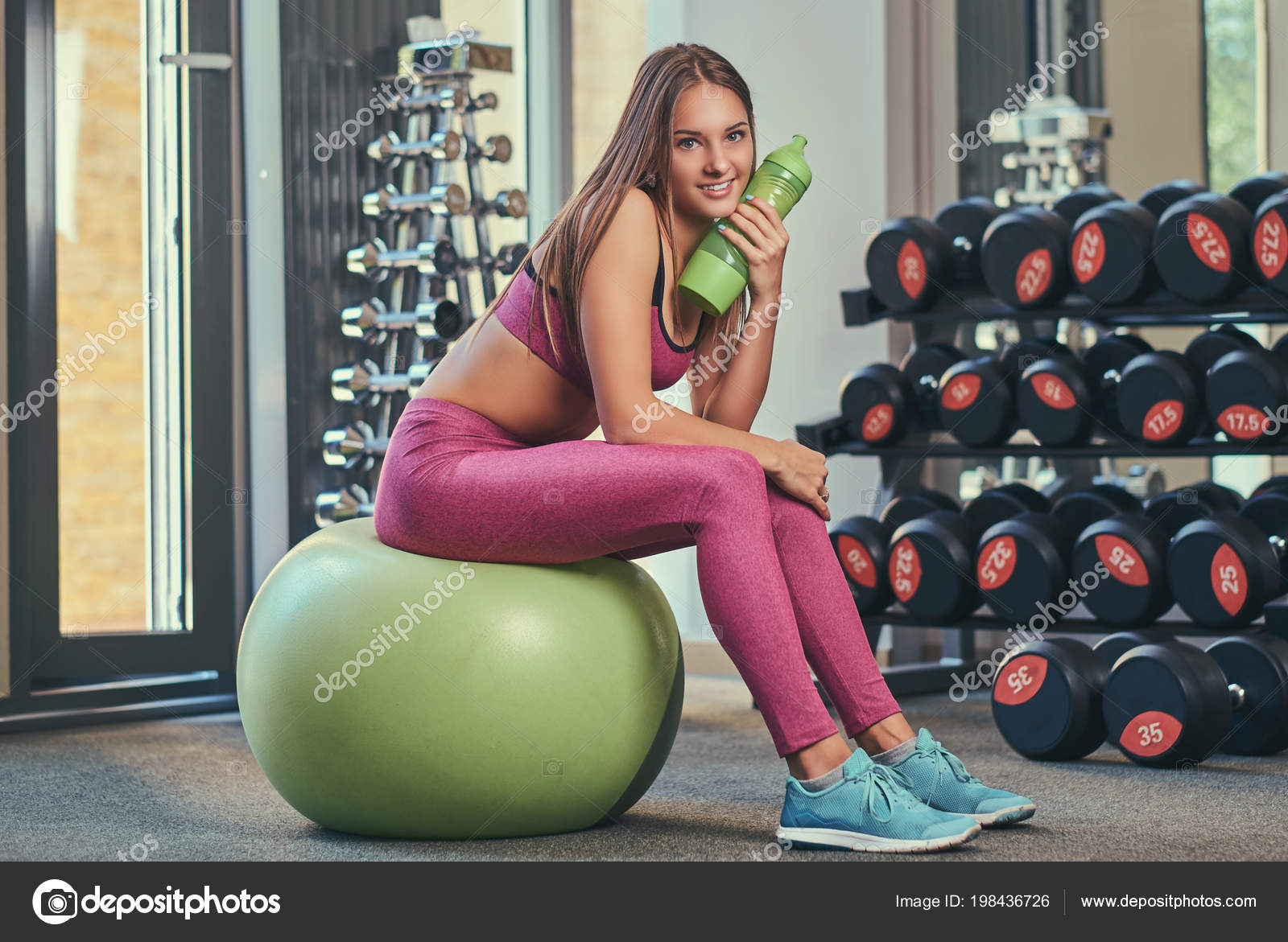 Young Smiling Pretty Girl Pink Sportswear Sitting Fitness Ball Bottle Stock  Photo by ©fxquadro 198436726