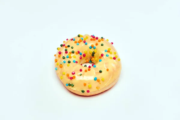 Appetizing donut with sprinkles isolated on white background. — Stock Photo, Image