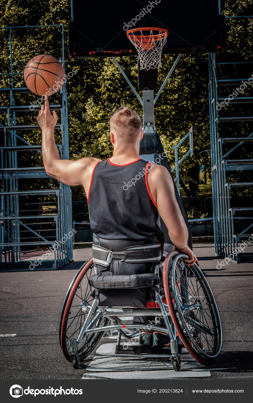 Back View Disabled Basketball Player Wheelchair Spinning Basketball His