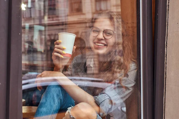 Smiling Young Redhead Curly Girl Wearing Casual Clothes Glasses Sitting — Stock Photo, Image