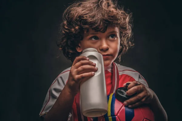 Little Champion Boy Sportswear Holds Ball Drinking Water Bottle Isolated — Stock Photo, Image