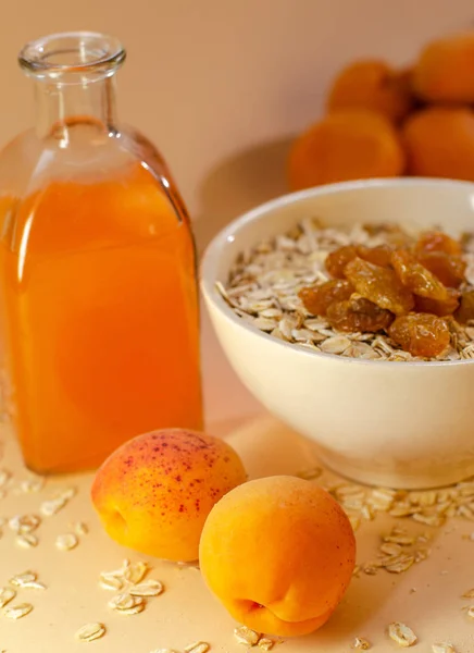 Healthy Breakfast White Plate Oatmeal Dried Apricots Glass Apricot Juice — Stock Photo, Image