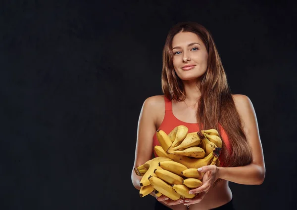 Ler Brunett Kvinna Klädd Sportbehå Håller Bananer Oncept Hälsosam Kost — Stockfoto