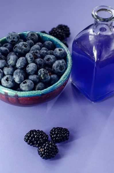 Fresh Berries Blueberries Plate Flowers Blackberries Glass Juice Raspberries Blue — Stock Photo, Image