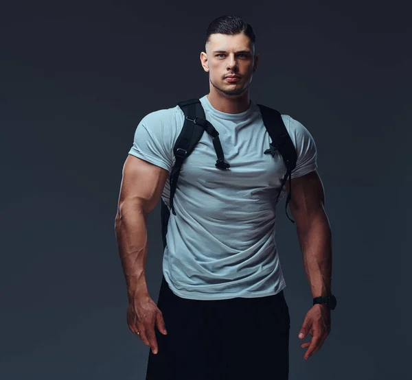 Muscular Handsome Bodybuilder Sportswear Rucksack Posing Gray Background — Stock Photo, Image