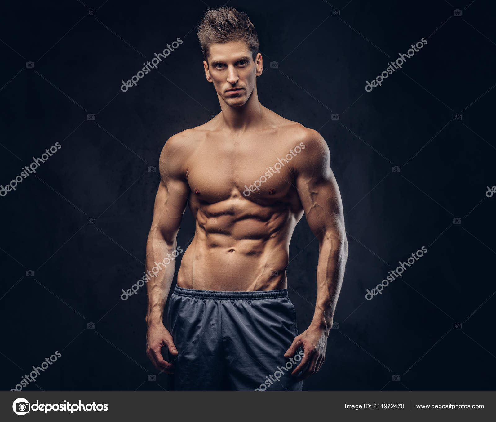 Handsome Shirtless Ectomorph Bodybuilder Stylish Hair Posing Dark Textured  Background Stock Photo by ©fxquadro 211972470