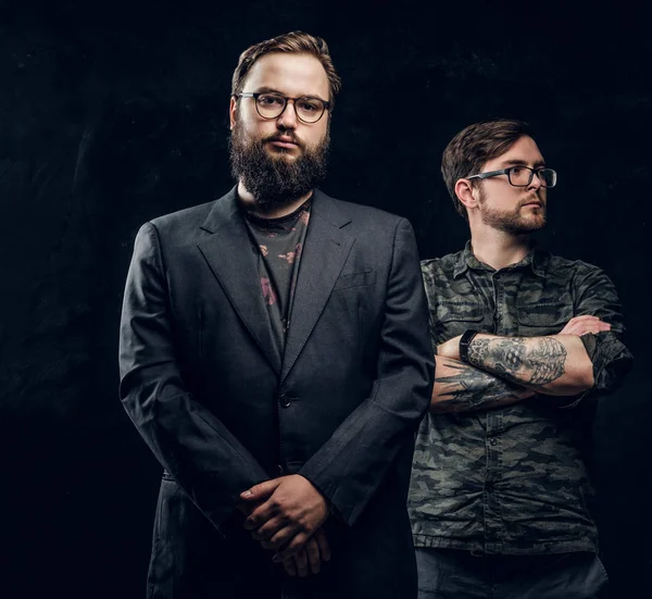 Two professional computer technicians posing with confident look in a studio — Stock Photo, Image