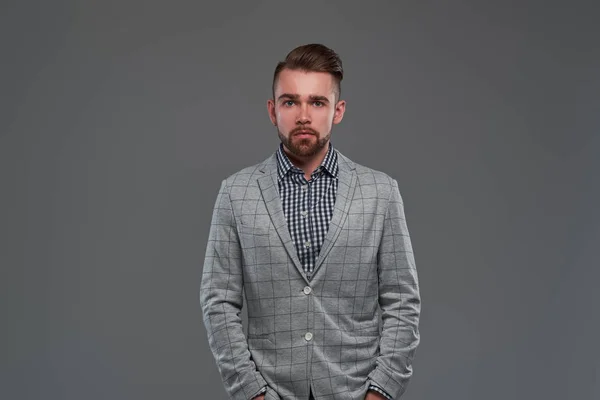 Portrait of styilish serious man in checkered blazer and shirt — Stock Photo, Image