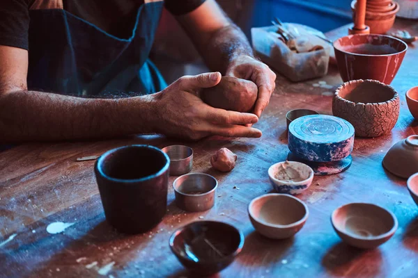 Photoshoot of working process with clay by diligent man. — Stock Photo, Image