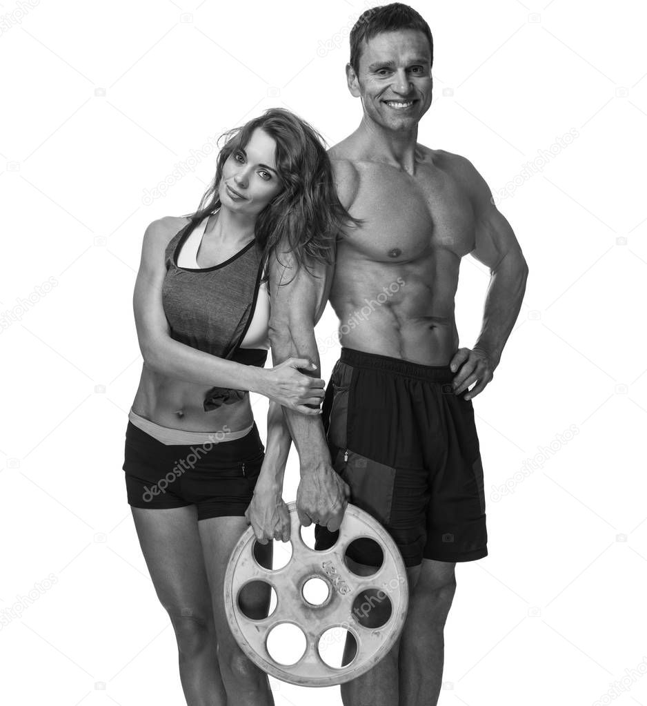 Sporty couple isolated on a white background.