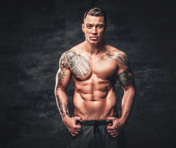 Fareham hairdresser wins 'tattooed model' world championship bodybuilding  title