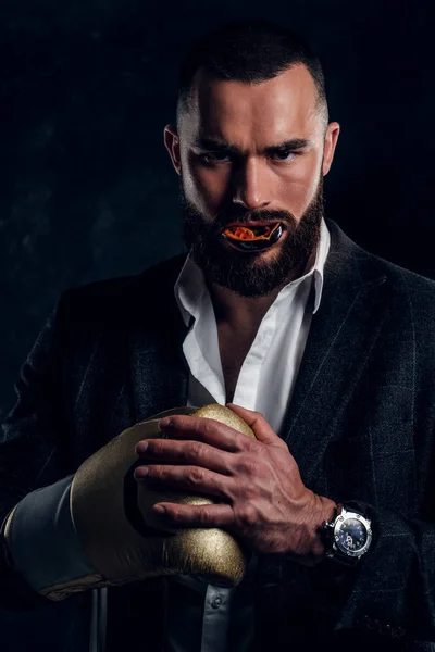 Portrait of handsome bearded man in boxing gloves — Stock Photo, Image