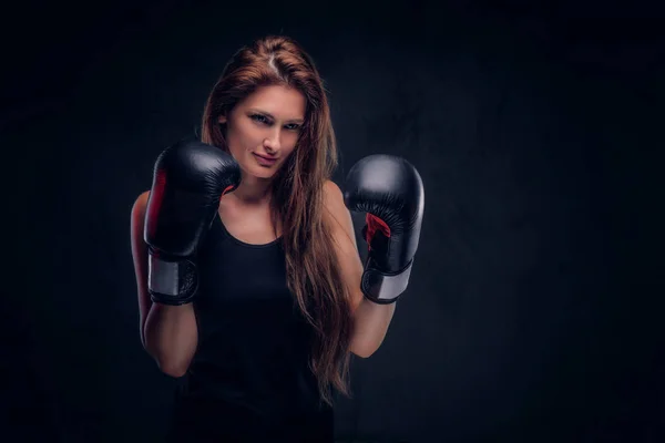 Portrait of attractive brunette in boxing gloves — Stock Photo, Image