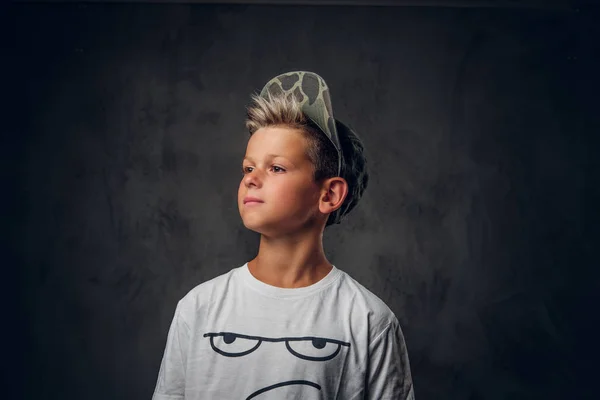 Portrait of young attractive schoolboy at photo studio — Stock Photo, Image