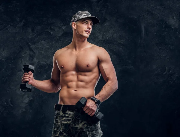 Portrait of shirtless muscular man over dark background — Stock Photo, Image