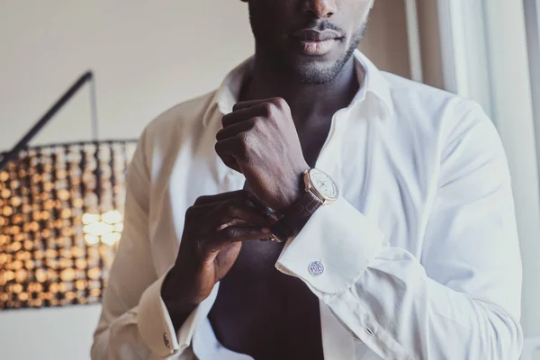 African man in white shirt at apartment — Stock Photo, Image