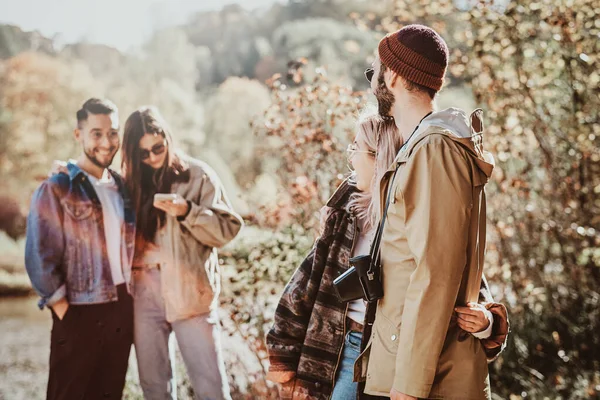 Group of stuents have a nise time at autumn forest — Stock Photo, Image