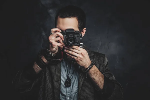 Reporter is taking a photo at photo studio