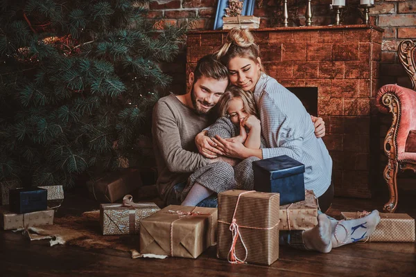 Happy family is celebrating Christmas at home — Stock Photo, Image