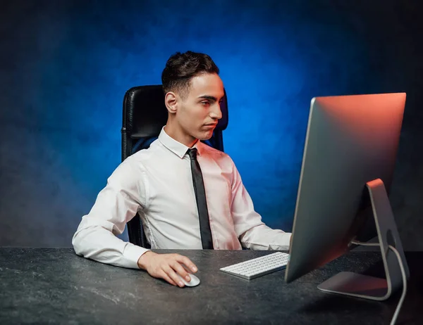 Busy young modern men in formalwear working using computer — Stock Photo, Image