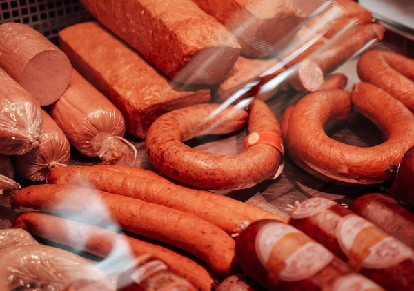 Much of meat and sausages in the butcher shop — Stock Photo, Image