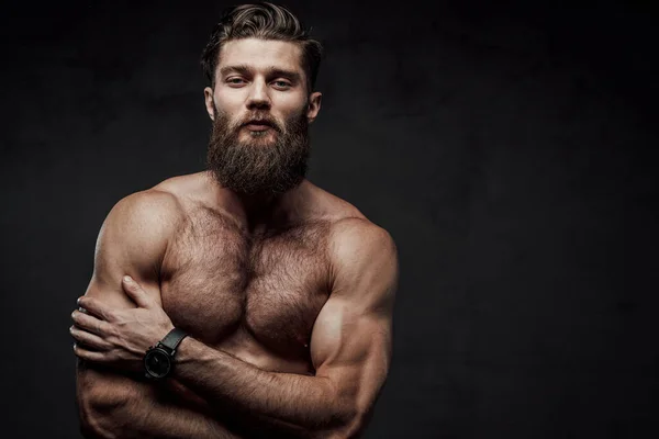 Muscular and naked guy posing with crossed arms — Stock Photo, Image