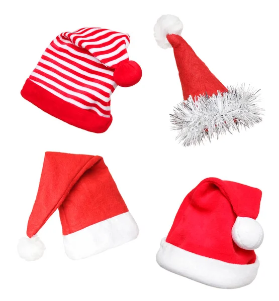Papai Noel chapéus vermelhos, isolados — Fotografia de Stock