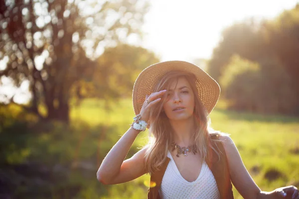 Cute charming girl in summer in the field. Young woman is happy and feels free outdoors — Stock Photo, Image