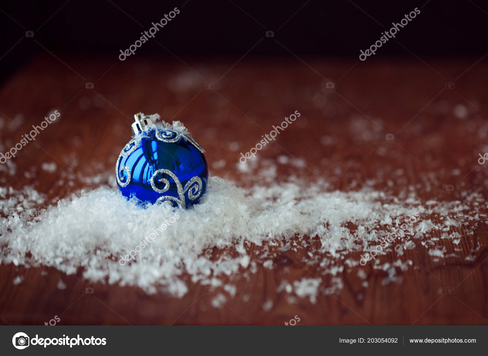 Christmas toy In a pile of snow wood textured background rustic style copy space on the right — ZdjÄ™cie od KrisCole