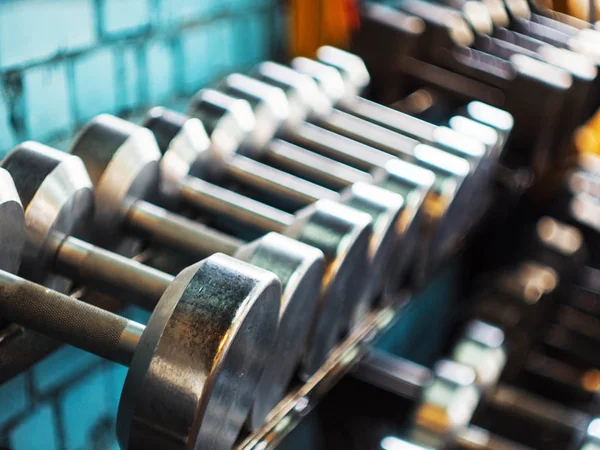 Number of dumbbells in the gym. Close up. — Stock Photo, Image