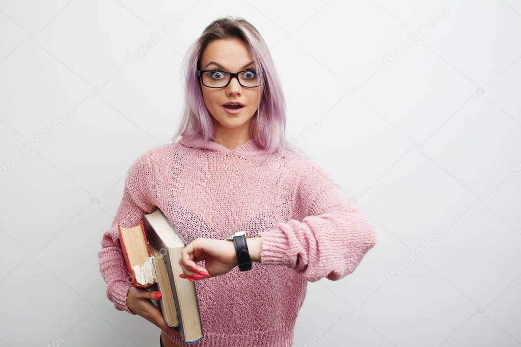 Time to learn. Student. Young woman with books.
