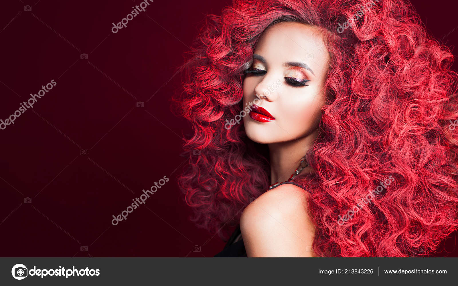 Beautiful young woman with red hair. Bright make-up and hairstyle Stock  Photo by ©KrisCole 218843226