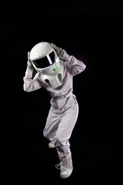 Astronaut in space holding the helmet. human in space, spacesuit — Stock Photo, Image