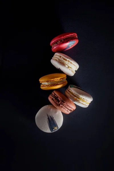 Elegant French desserts. Set of colorful macaron decorated by toppings. — Stock Photo, Image