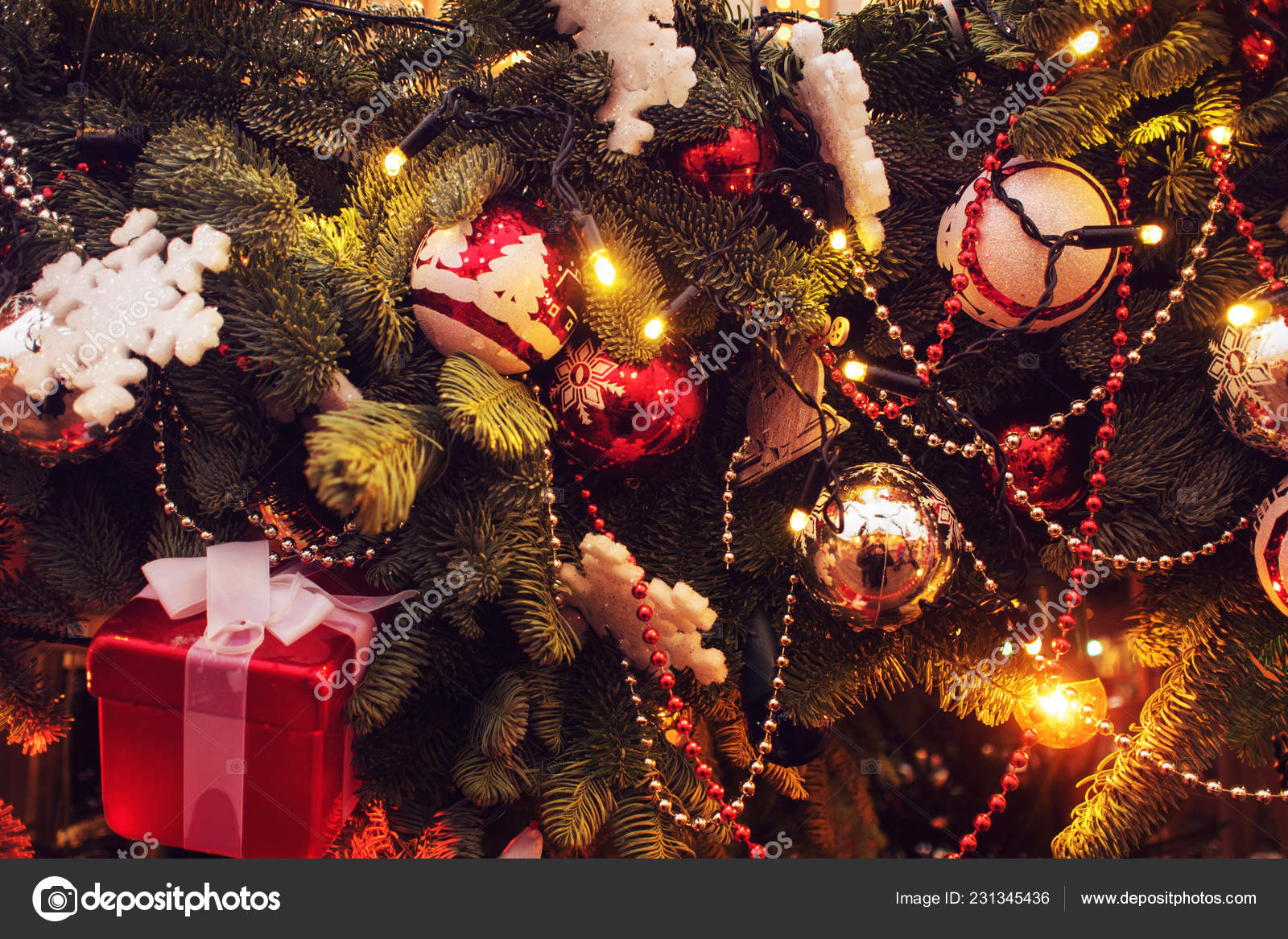 Download Festive Christmas Tree with Gold and Silver Decorations