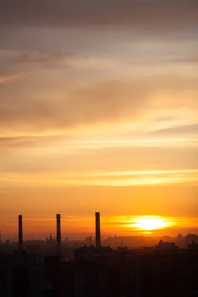 Three chimneys at sunset, city landscape — Stock Photo, Image