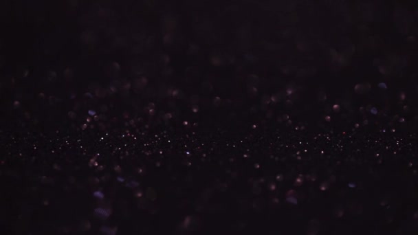 Fondo mágico de purpurina. Luz desenfocada y lugar libre enfocado para su diseño . — Vídeos de Stock