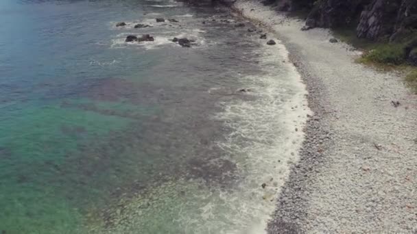 Aircraft view of beautiful rocky coastline, blue wave and amazing sea. — Stock Video