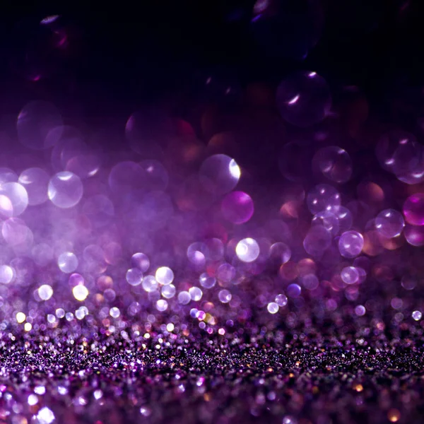 Fondo mágico de purpurina. Luz desenfocada y lugar libre enfocado para su diseño . — Foto de Stock