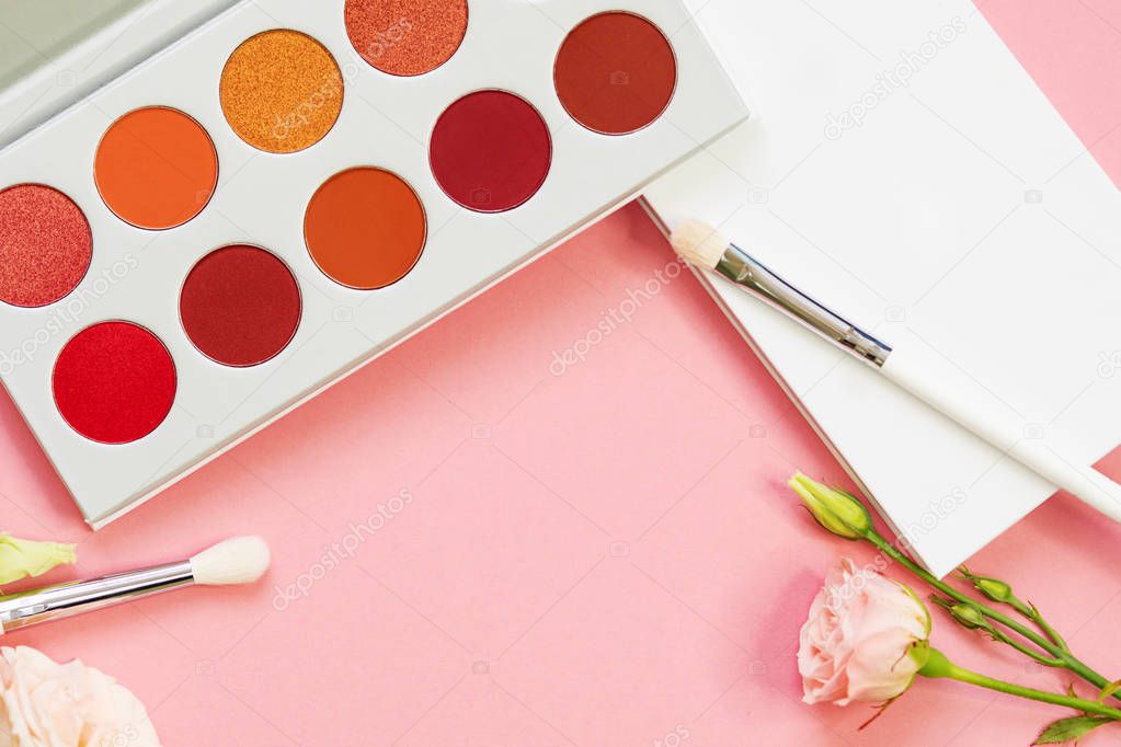 Set for eye makeup, eyeshadow in a palette and brush for a good application