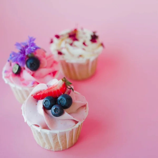 Set of delicious cupcakes with different fillings and cream. Three muffin's with cream — Stock Photo, Image