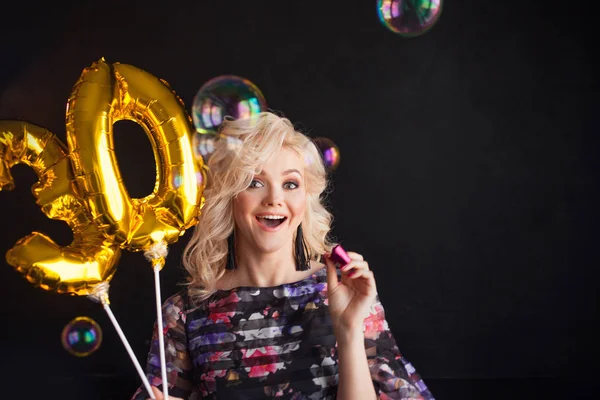 Happy young woman having fun at birthday party. Birthday girl — Stock Photo, Image