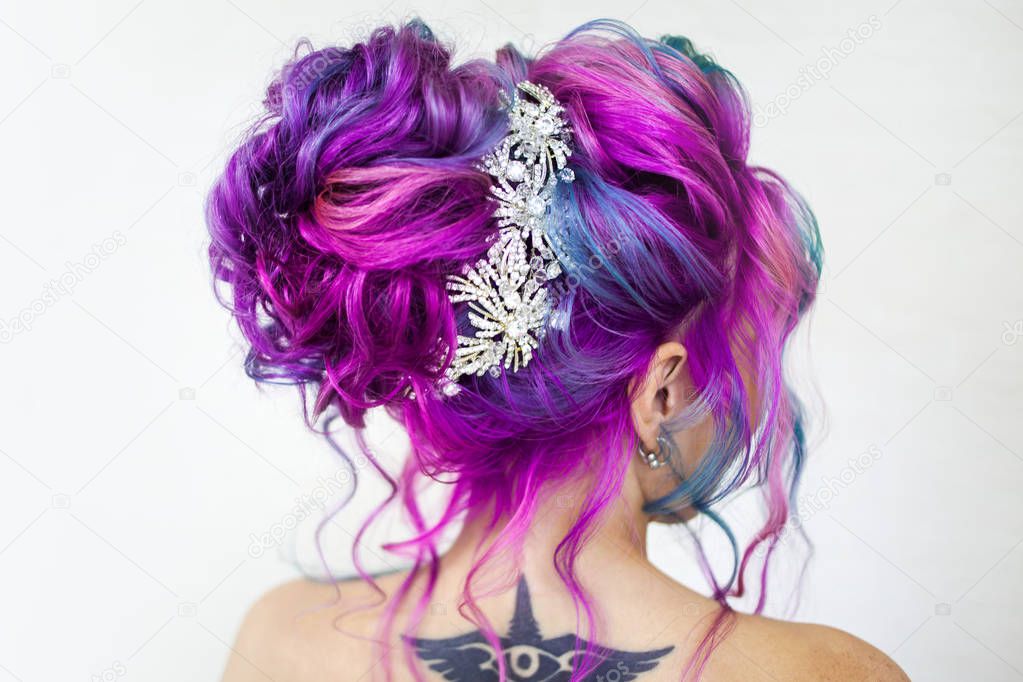 Incredible hair color, bright blue and Magenta gradient. Stylish fashionable hair coloring.