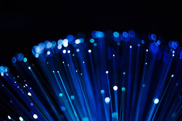 Абстрактный сферический фон, оптическое волокно голубые светящиеся точки и линии
