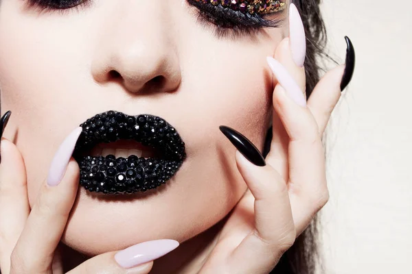 Black lips covered with rhinestones. Beautiful woman with Black lipstick — Stock Photo, Image