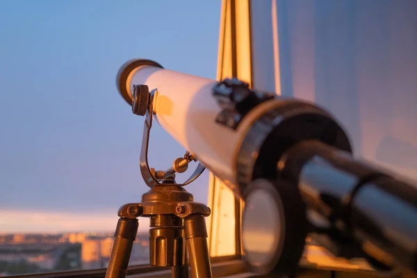 telescope on the balcony, Telescope on the tripod, shallow