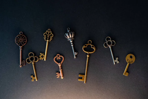 Many different old keys from different locks, scattered chaotically,