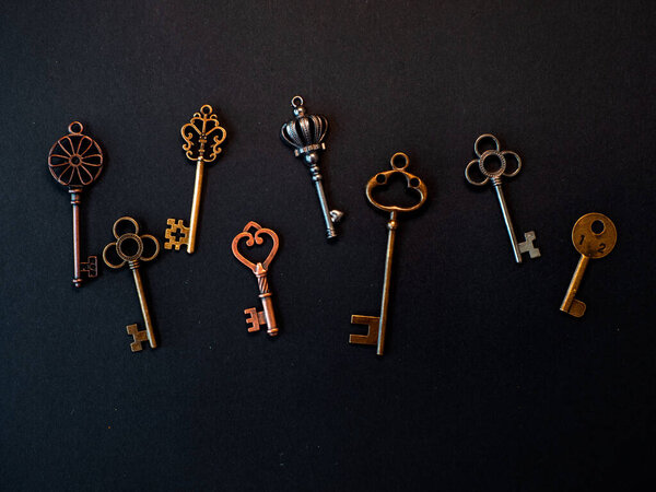 Many different old keys from different locks, scattered chaotically,