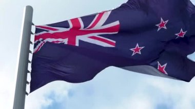 Yeni Zelanda bayrağı rüzgarda dalgalanıyor. Mavi gökyüzüne karşı ulusal bayrak,